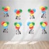 Our Graduation Decor Package 12 includes a curtain backdrop, a 2023 wooden sign, an organic balloon arch, 8 balloon clusters, & 8 topiary centerpieces